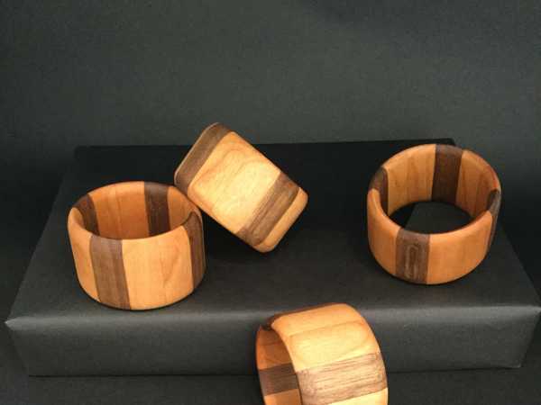 Four Walnut and Cherry Napkin Rings